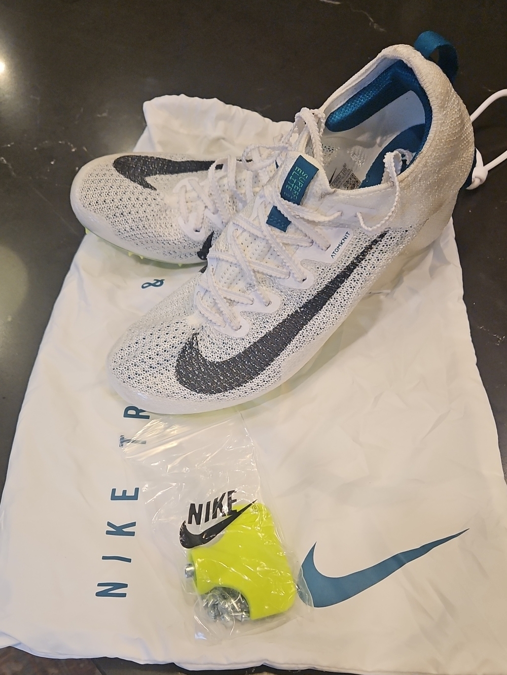 Nike White Superfly Elite 2 Running Spikes with Black Swoosh & Teal Accents
